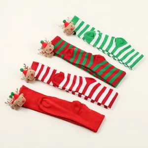 Four pairs of festive Christmas over-the-knee socks with 3D plush reindeer dolls.