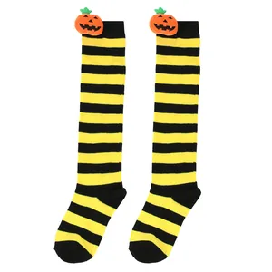 Halloween children's knee-high socks with yellow and black stripes and pumpkin plush