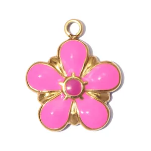 Detailed macro view of a pink enamel five-petal flower pendant in gold stainless steel