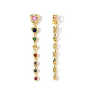 Detailed macro view of heart-shaped multi-color zircon long tassel pendant gold plated