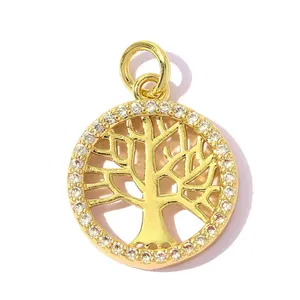 Detailed close-up view of gold-plated Tree of Life pendant with sparkling cubic zirconia border
