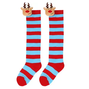 Detailed view of red and blue striped Christmas socks featuring 3D plush reindeer dolls.