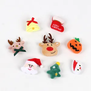Detailed view showing assorted Christmas and Halloween themed mini plush patches