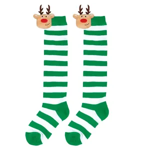 Detailed view of children's Christmas knee-high socks with 3D reindeer plush doll