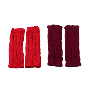 Cable knit fingerless arm warmers in vibrant red and deep burgundy winter colors