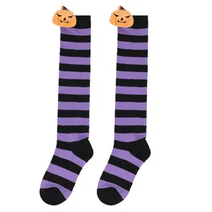 Halloween purple and black striped knee-high socks with cute plush pumpkin dolls
