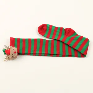 Red and green striped over-the-knee Christmas socks with plush reindeer detail