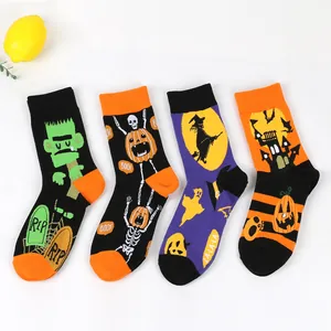 Detailed view of Halloween themed men's cotton socks with pumpkin and witch patterns