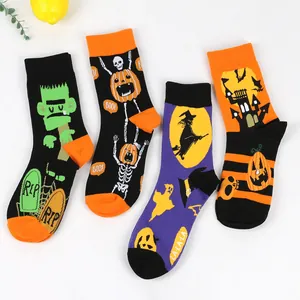 Close-up of Halloween men's cotton socks with pumpkin, witch, and ghost patterns