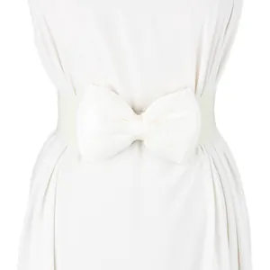 Detail view of white elastic waist belt with large elegant chiffon bow ornament.