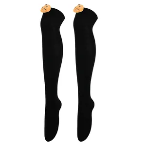 Halloween black over-the-knee socks featuring cute orange pumpkin plush doll decorations