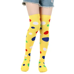 Bright yellow over-the-knee socks featuring vibrant multi-colored polka dots for cosplay events.