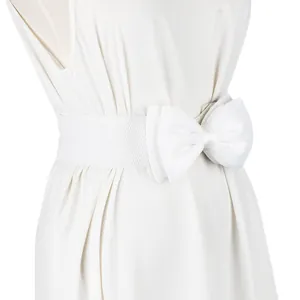 Close-up detail of a white elastic belt featuring a large fabric bow for dresses