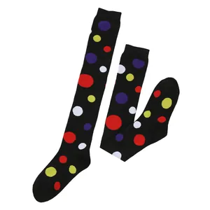 Black over-the-knee socks with colorful red, yellow, and purple polka dots