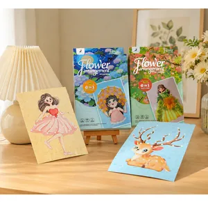 Detalle de kits de tarjetas de pintura artística de arreglos florales DIY para niños.