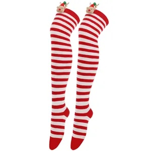 Detail view of festive red and white striped over-the-knee socks with reindeer decor.