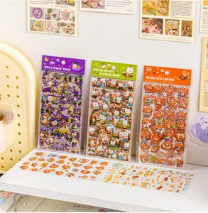 Detailed view showing variety of cute animal cartoon PVC stickers for journal decorating