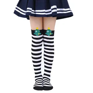 Children's over-the-knee Christmas socks with black and white striped pattern and plush trees