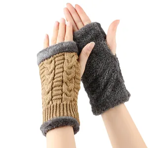 Detailed view of thick knit cable pattern and plush faux fur lining on fingerless gloves