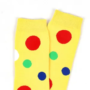 Macro view of yellow over-knee socks featuring vibrant multi-colored polka dots for cosplay.