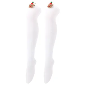 Detail of white over-the-knee socks with cute Christmas elk plush decoration.