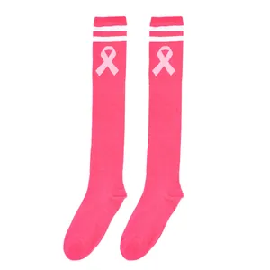 Detailed view of pink breast cancer awareness knee-high socks with ribbon symbol