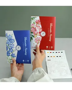 Close-up of Yuelu watercolor painting books with 12 solid colors and coloring sheets