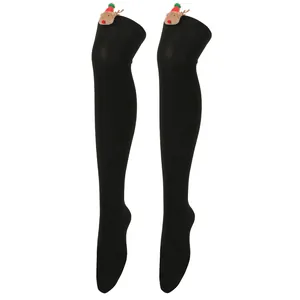 Detail of black over-the-knee Christmas socks with cute 3D reindeer plush decoration.
