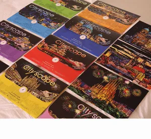 Collection of various A3 Cityscape scratch painting kits with vibrant cityscape designs
