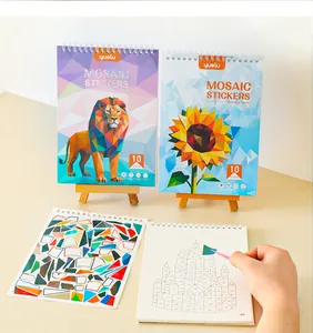 Close-up of children's mosaic sticker book DIY process with geometric lion and sunflower designs