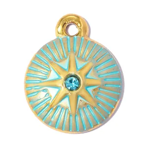 Detailed view of the gold star pendant with light blue enamel and central rhinestone.