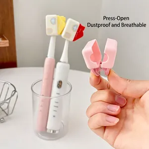 Copritestina per spazzolino in colori pastello con design antipolvere