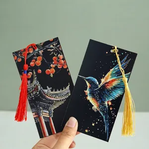 Exquisites Set mit zwei Rubbel-Lesezeichen mit bunten Quasten und Vogelmotiven