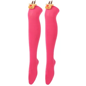 Close-up of bright pink Christmas over-the-knee socks with reindeer plush decoration