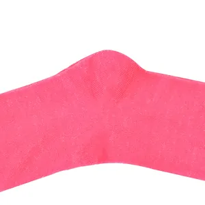 Close-up detail of the reinforced heel on a bright pink knitted knee-high sock
