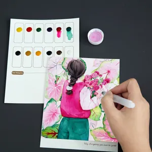 Creative watercolor coloring book set with 12 solid paints and a water brush pen.