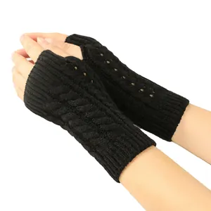 Black cable knit fingerless gloves with hollow-out design for winter warmth