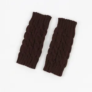Dark brown cable knit fingerless gloves with a classic figure-eight pattern detail