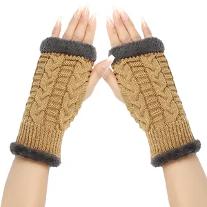 Close-up of thick winter cable knit fingerless gloves with soft gray fur trim