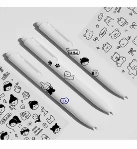 Close-up of cute cartoon PVC stickers applied on white gel pens for DIY handbooks