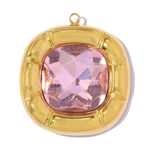Close-up of a square pink crystal pendant set in a gold-plated stainless steel frame.