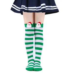 Over-the-knee green and white striped children's Christmas socks with Santa doll detail