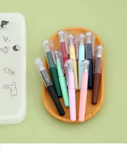 Assorted colorful mini gel pens displayed in a wooden tray for detailed macro view