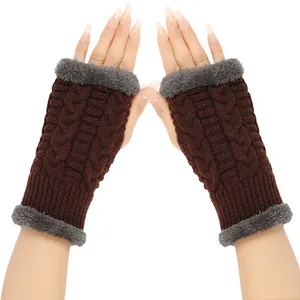 Detail view of brown cable-knit fingerless gloves featuring grey plush faux fur trim