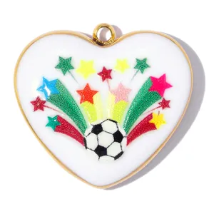Detailed macro view of the vibrant soccer ball and colorful glitter star design on a heart pendant