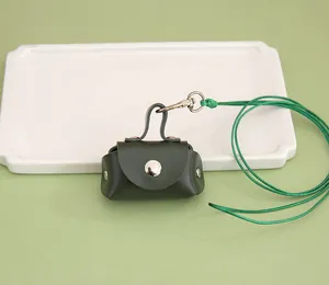 Minimalist dark green PU leather mini coin purse with lanyard and silver snap closure