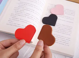 Detail showing colorful heart-shaped PU leather corner bookmarks protecting book pages