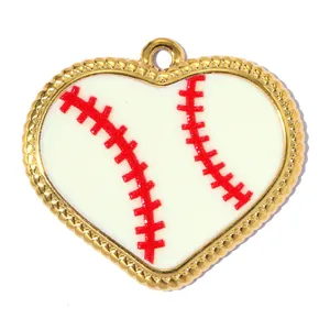 Detail of heart-shaped baseball pendant featuring red textured stitching and golden beaded edge