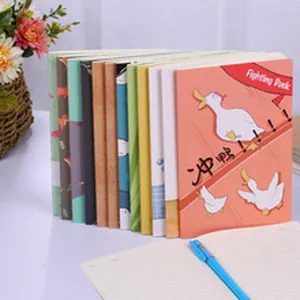 Detailed view of stack of cartoon A4 sketchbooks with Fighting Duck design for art