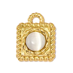 Detailed close-up of a French retro gold stainless steel square pendant with cat's eye stone